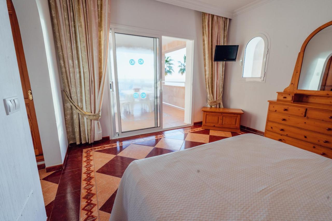 Apartamentos Punta Prima Beach ภายนอก รูปภาพ