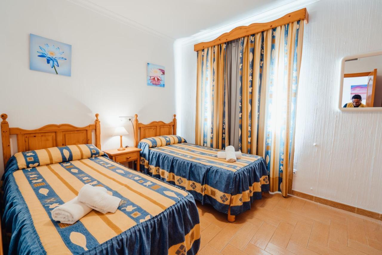 Apartamentos Punta Prima Beach ภายนอก รูปภาพ